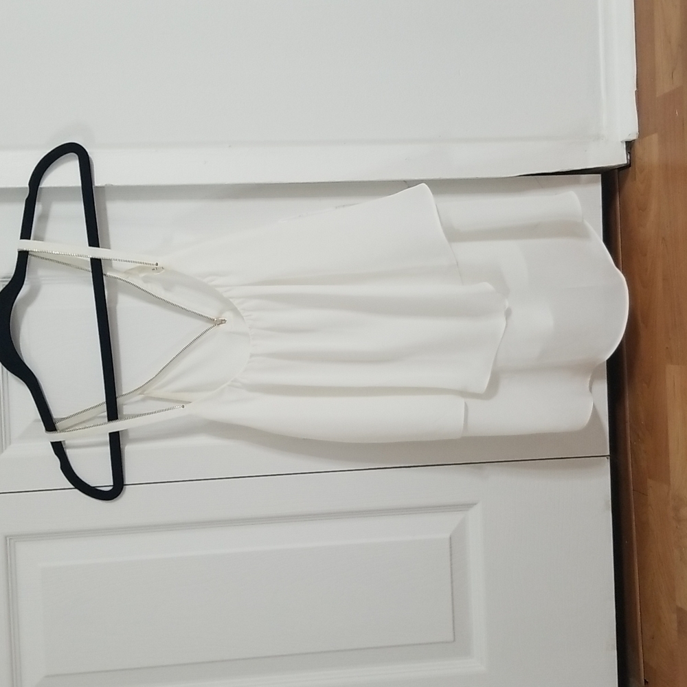 White flowy tank top with zipper detail on the back